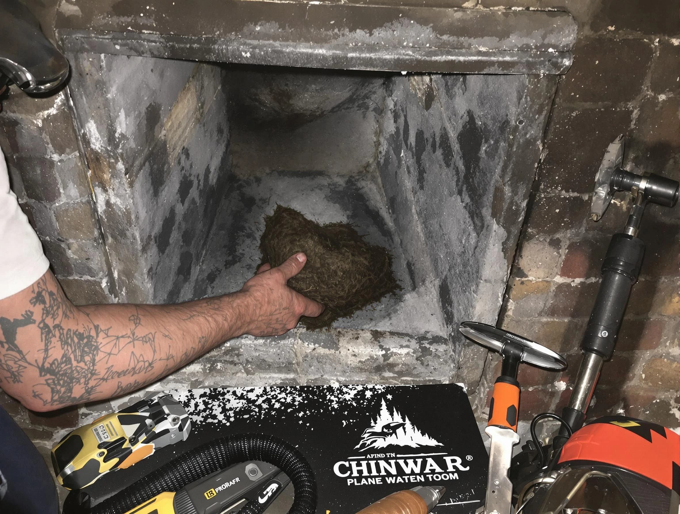 Belleville Chimney Sweep safely removing debris and screening chimney in Belleville, NJ